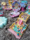 Collection of Polly Pocket`s, miniature dollhouses, that were very popular in the 90`s and now are coveted