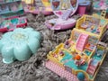 Collection of Polly Pocket`s, miniature dollhouses, that were very popular in the 90`s and now are coveted