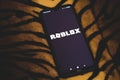 March 23, 2021, Brazil. In this photo illustration a Roblox logo seen displayed on a smartphone