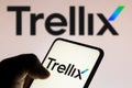 March 10, 2022, Brazil. In this photo illustration the Trellix logo seen displayed on a smartphone and on the background