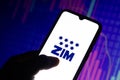 March 29, 2021, Brazil. In this photo illustration a Zim Integrated Shipping Services logo seen displayed on a smartphone Royalty Free Stock Photo