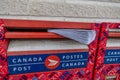 13 March 2025 - Calgary Alberta Canada - Envelopes dropped in Canada Post mail box Royalty Free Stock Photo