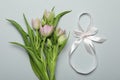 8 March card design with tulips on light grey background, flat lay. International Women`s Day Royalty Free Stock Photo