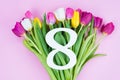 8 March congratulations concept. High angle above view photo of beautiful multicolored bouquet of different tulips with white