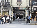 20 March 2019 - Crowd of Tourists standing on French concession road near Tianzifang market Exit Gate No.2, Shanghai, China