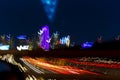 MARCH 5, 2018, DALLAS SKYLINE TEXAS, and Tom Landry Freeway, with streaked lights on Interstate 30. Night, Speed