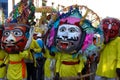 13 March 2022, Dang Darbar- Ahwa, Gujarat - India, People with huge traditional face mask celebrating the festival of tribal