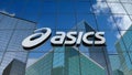 Editorial, ASICS Corporation logo on glass building.