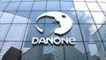 Editorial, Danone S.A. logo on glass building.