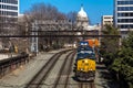 MARCH 26, 2108 - Freight train with US Capitol in background approaches L'enfant Plaza Station,. Passage, motion