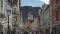 March 31, 2024. Fussen, Germany. Altstadt, Fuessen, Bayern, Deutschland. Old town in sunny weather with people resting