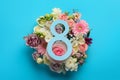 8 March greeting card design with beautiful flowers on light blue background, flat lay. International Women`s day Royalty Free Stock Photo