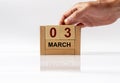 3 March inscription on wooden calendar