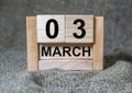 3 March inscription on wooden calendar