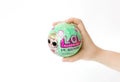 March 09, 2017: L.O.L. Surprise toy a popular. A child is holding a toy in the hands of a surprise