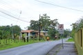 March 7 2023 - La Fortuna, Costa Rica: Main street with cars, shops and pedestrians