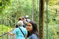 March 7 2023 - La Fortuna, Costa Rica: People walk over a hanging bridge in Arenal Volcano National Park