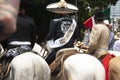 March for LGBTTI pride in Mexico City, Mariachis to entertain the mounted on their horses wearing hats among the people who demons
