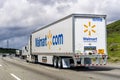 March 20, 2019 Los Angeles / CA / USA - Walmart truck driving on the interstate among hills on a cloudy day