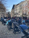March 18, 2022 - Lviv, Ukraine: Installation of empty baby carriages on the main square of the city in memory of the