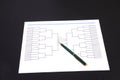 March Madness Pen and Blank Tournament Bracket Royalty Free Stock Photo