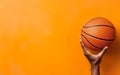 March madness poster. A hand holding basketball ball. Photorealistic orange basketball ball on orange background. AI Generative