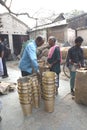 March 3, 2017, Matiari, West Bengal, India. Buyers Checking The Brass Buckets That Were Fabricated At A Nearby Shop.