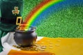 March meme, Ireland national day and Happy St Patrick`s concept with green leprechaun hat with shamrock, pot of gold at the end o Royalty Free Stock Photo