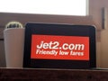 March 2020 Milan, Italy: Jet2 company logo icon on tablet screen close-up. Jet 2 visual brand Royalty Free Stock Photo