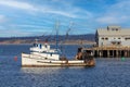 March 9, 2023 - Monterey, CA, USA: Older fishing boat at anchor in Monterey Bay, California.