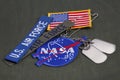 15 March 2018 - The National Aeronautics and Space Administration (NASA) emblem patch, dog tags, US AIR FORCE branch tape and US Royalty Free Stock Photo