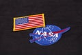 15 March 2018 - The National Aeronautics and Space Administration (NASA) emblem patch and US Flag patch on black uniform Royalty Free Stock Photo