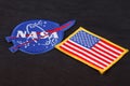 15 March 2018 - The National Aeronautics and Space Administration (NASA) emblem patch and US Flag patch on black uniform Royalty Free Stock Photo