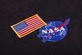 15 March 2018 - The National Aeronautics and Space Administration (NASA) emblem patch and US Flag patch on black uniform Royalty Free Stock Photo