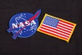 15 March 2018 - The National Aeronautics and Space Administration (NASA) emblem patch and US Flag patch on black uniform Royalty Free Stock Photo