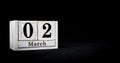 March 2nd, Second of March, Day 2 of month March - white calendar blocks on black textured background with empty space for text Royalty Free Stock Photo