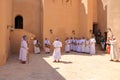 March 17 2022 - Nizwa, Oman: Omani men dancing a traditional sword dance at Nizwa Fort