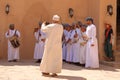 March 17 2022 - Nizwa, Oman: Omani men dancing a traditional sword dance at Nizwa Fort