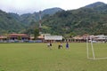 March 3 2023 - Orosi, Costa Rica: Football playing children in the center of the village Royalty Free Stock Photo