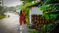 women and girl standing road side