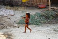 indian villagers kid playing in street