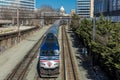MARCH 26, 2108 - Passenger Metro train with US Capitol in background approaches L'enfant Plaza. Railway, fast