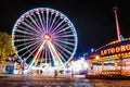 Lighting Ferris wheel at night in famous Prater theme amusement Park, Vienna Royalty Free Stock Photo