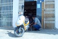 2 march 2021,riyadh Saudi Arabia,An Indian motor bike mechanic at work with safety mask,