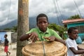 Garifuna boy drumming in Honduras