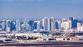 March 19, 2019 San Diego / CA / USA - Panoramic view of the downtown skyline; San Diego Naval Base on Coronado Island visible in Royalty Free Stock Photo