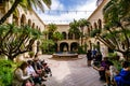 March 19, 2019 San Diego / CA / USA - People sitting in the Prado interior courtyard in Balboa Park Royalty Free Stock Photo