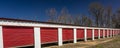 MARCH 6, 2018 - Self storage warehouse with open red doors outside Marshall - Texas. Vacation, structure Royalty Free Stock Photo
