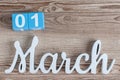 March 1st. Day 1 of march month, color calendar on wooden background. Spring time begining