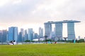 2019 March 1st, Singapore, Marina Barrage - Panorama view of the city buildings and people doing their activities at sunset Royalty Free Stock Photo